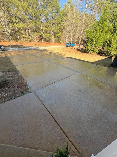 How can driveway and walkway cleaning improve curb appeal